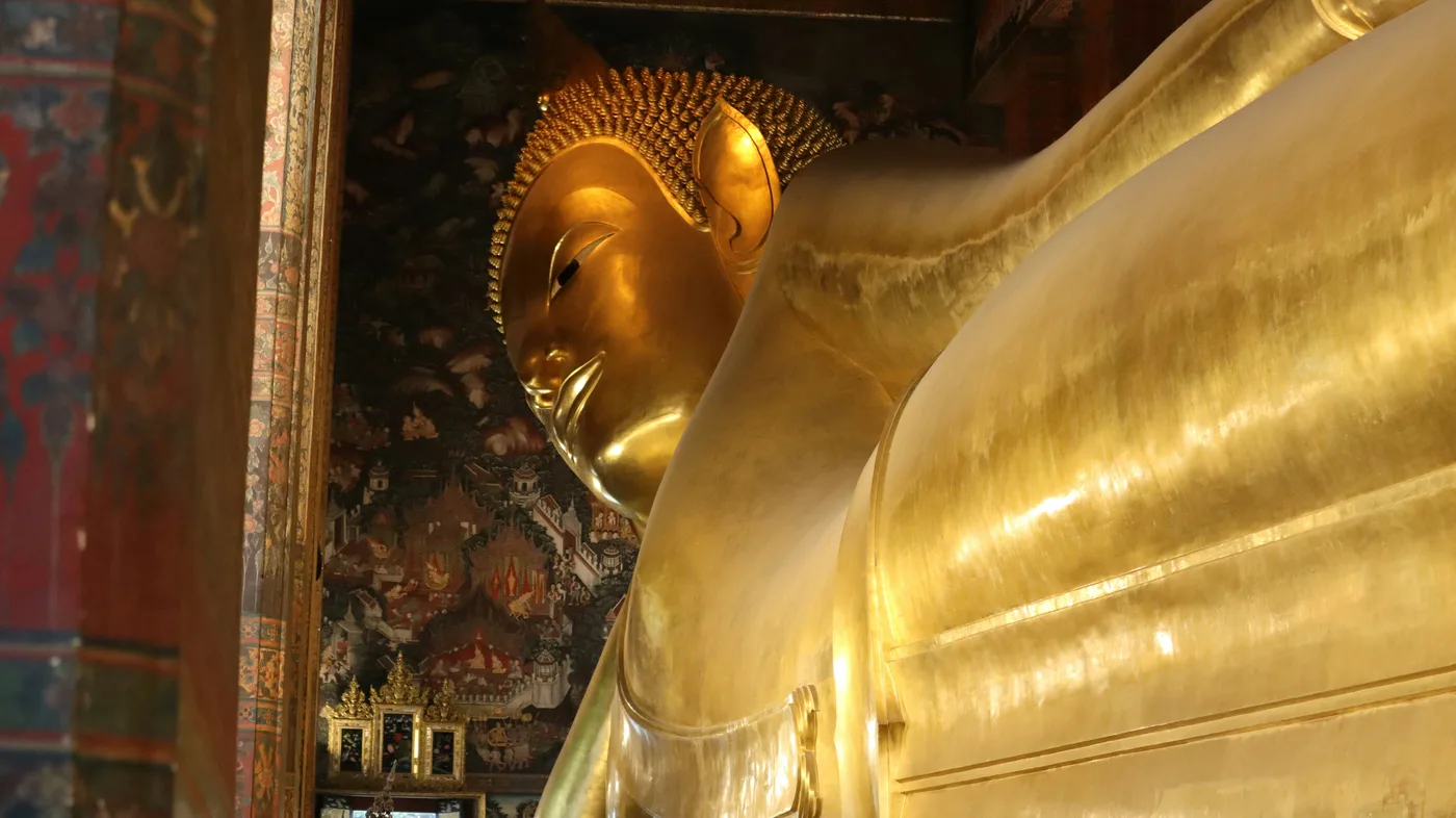 Golden reclining Buddha detail in Bangkok