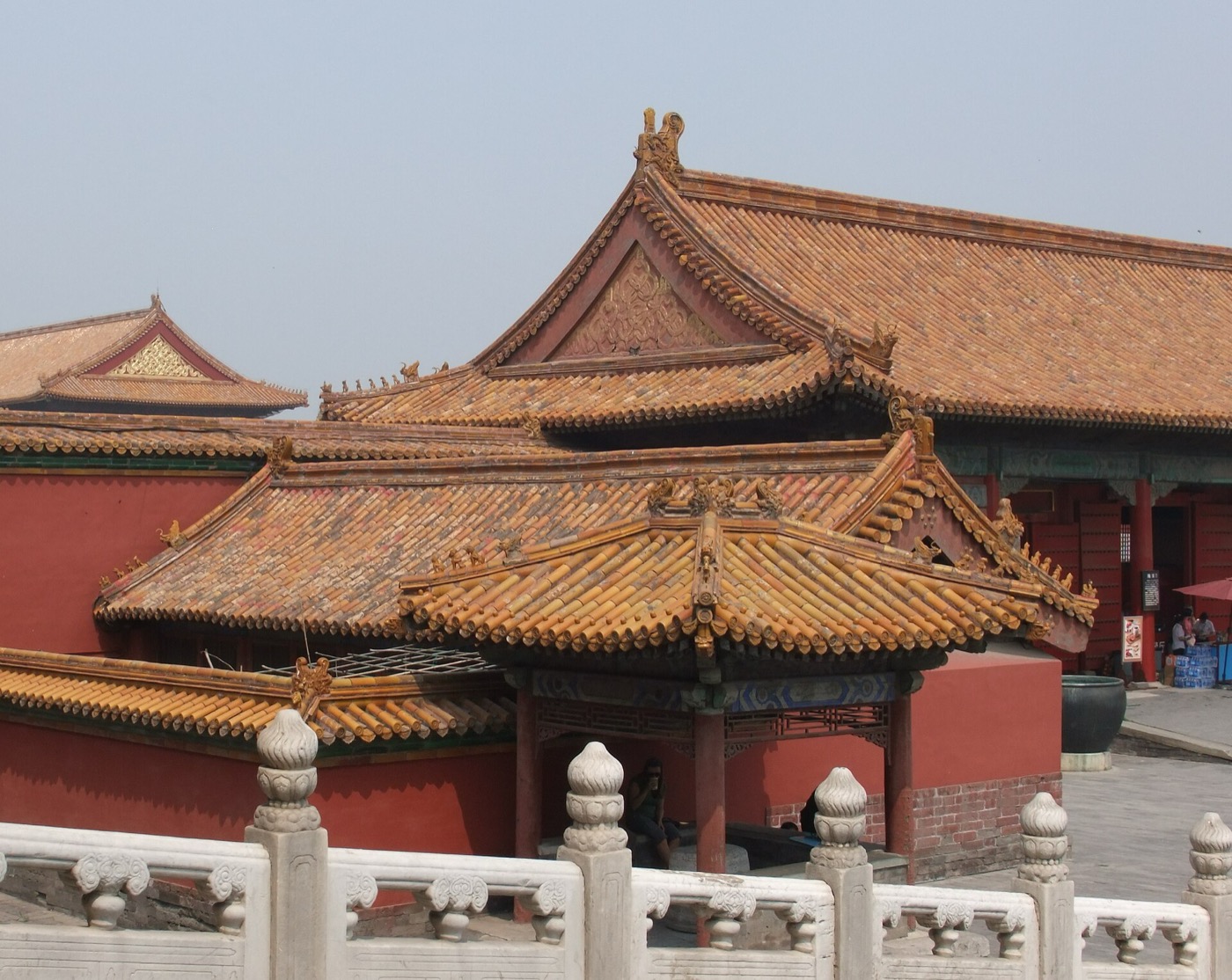 Close view of yellow tiled rooflines inside the Forbidden City in Beijing.