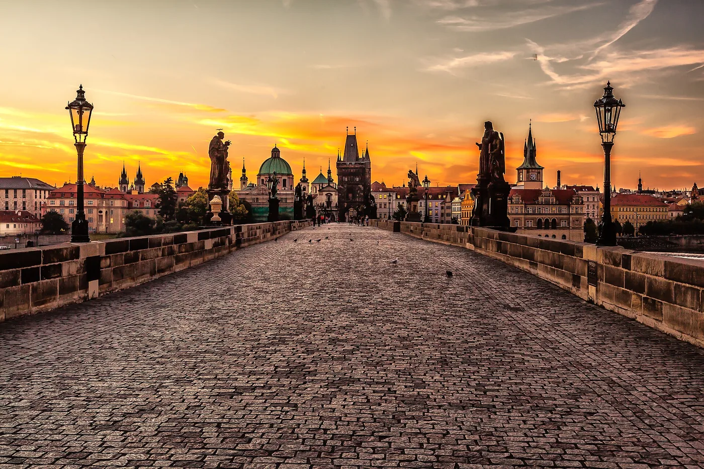 Prague skyline and river at sunrise near Charles Bridge