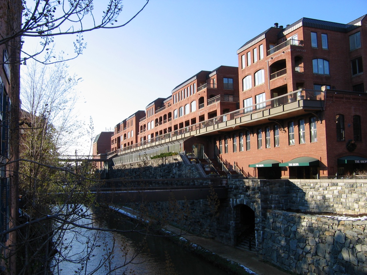 C&O Canal passing brick buildings in Georgetown, Washington, D.C.